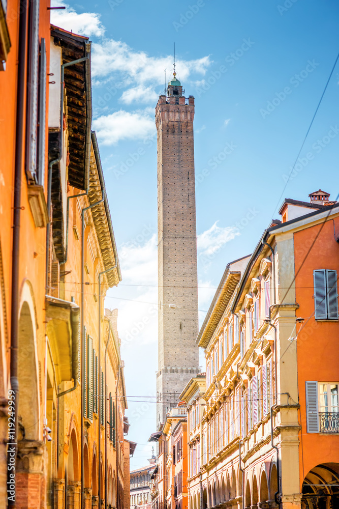 Street view with famous Asinelli tower in Bologna city in Italy. Bolognas two leaning towers are th