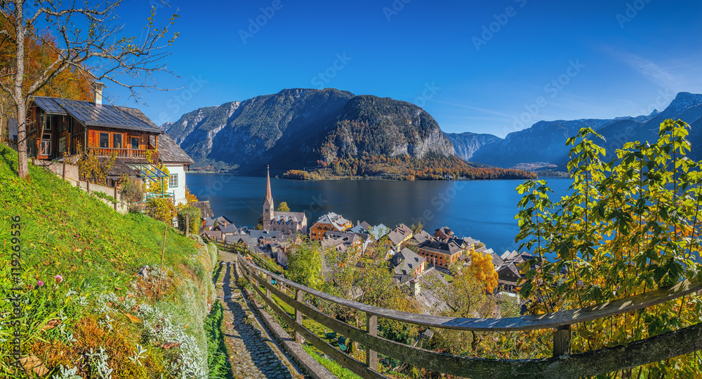 Historic mountain village of Hallstatt with lake in fall, Austria