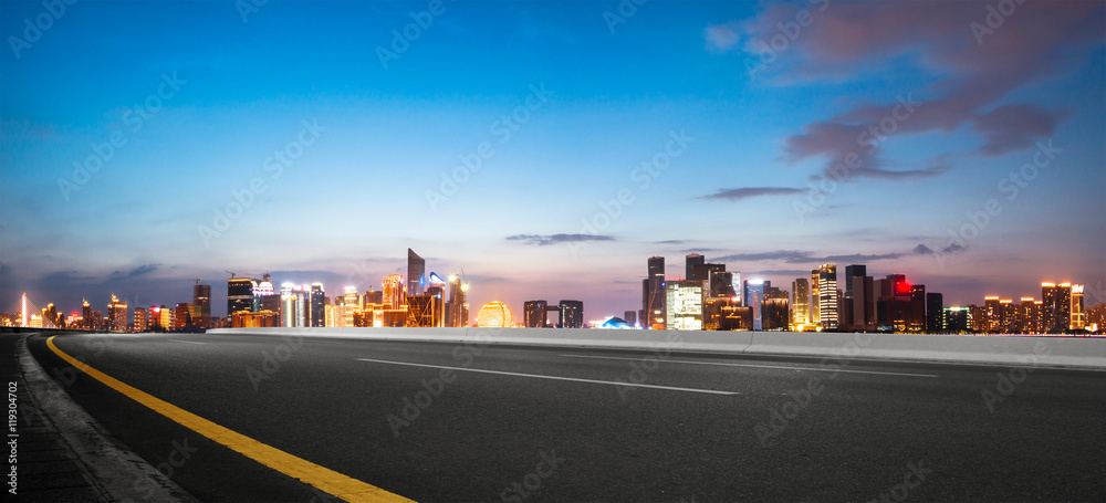 cityscape and skyline of hangzhou from empty road