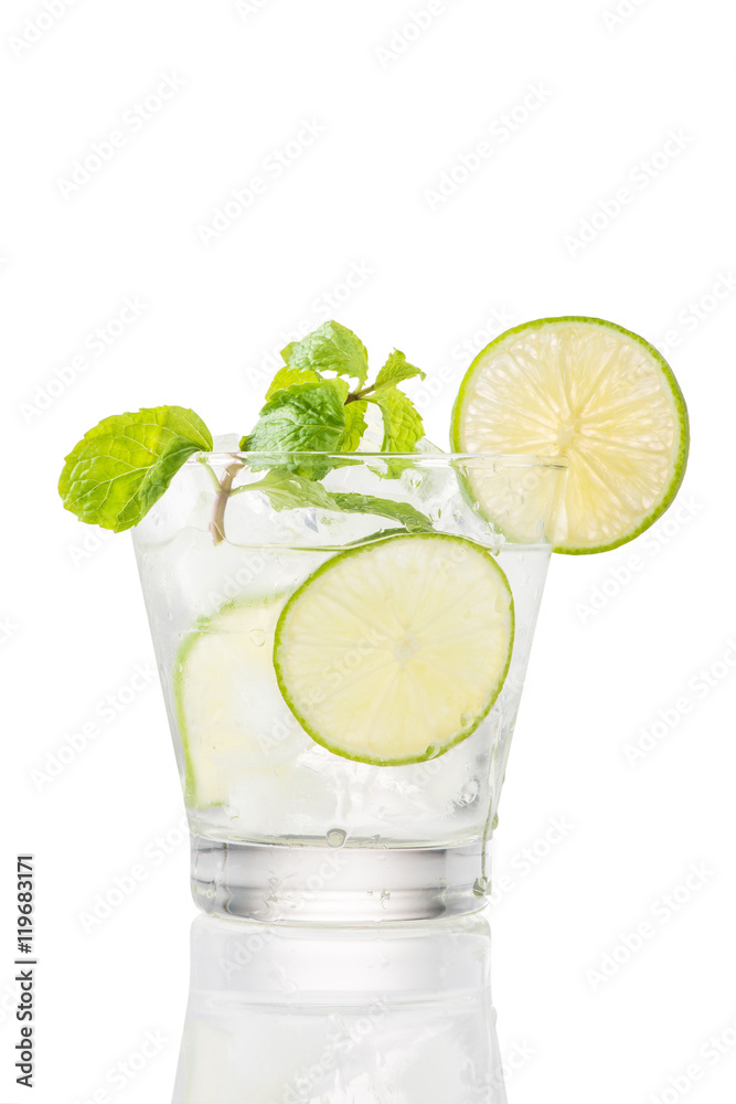 Full glass of water with lemon and mint isolated on white background