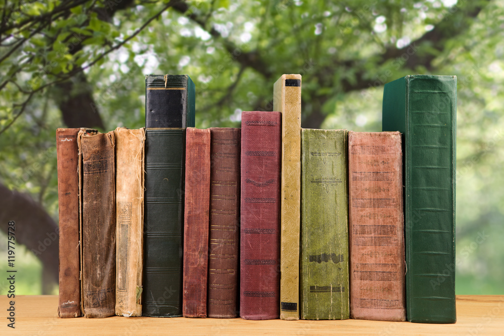 Open books on wood planks 