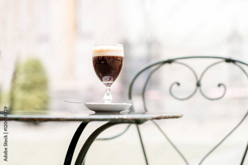 Bicerin traditional Italian coffee made of espresso, chocolate and whole milk served layered in a ro