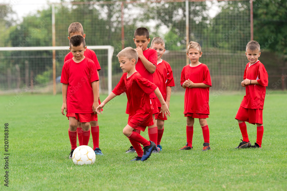  Boys kicking ball