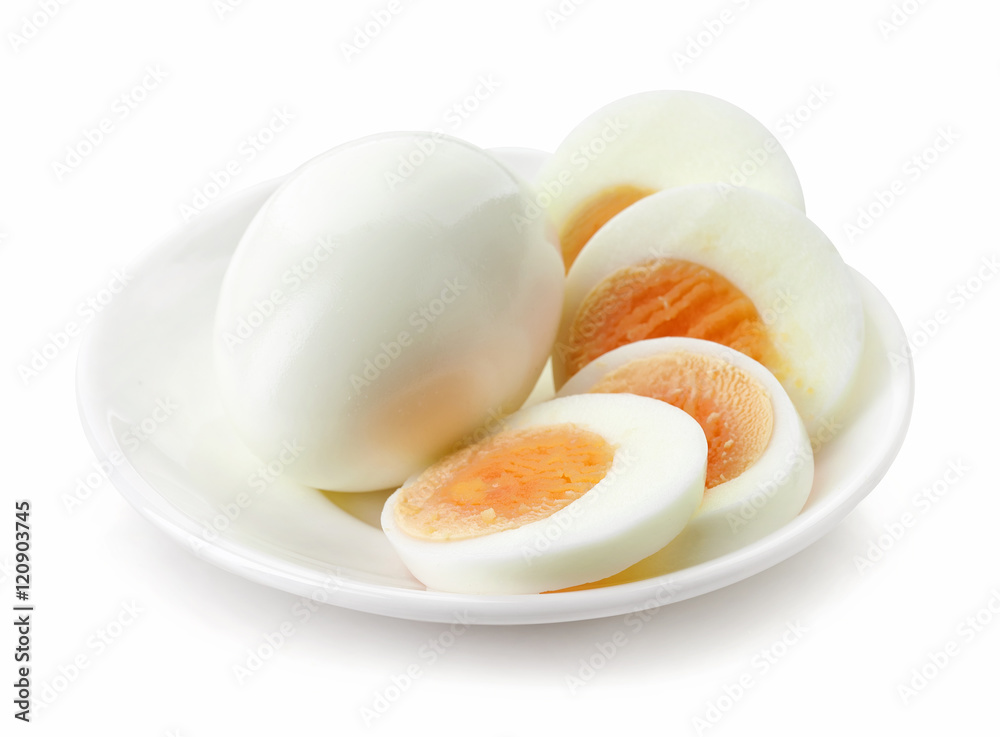 sliced egg on white plate