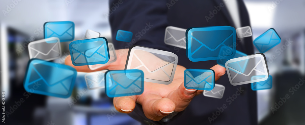 Businessman holding digital email icons ‘3D rendering’