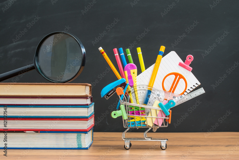 School equipment with textbook on desk for back to school