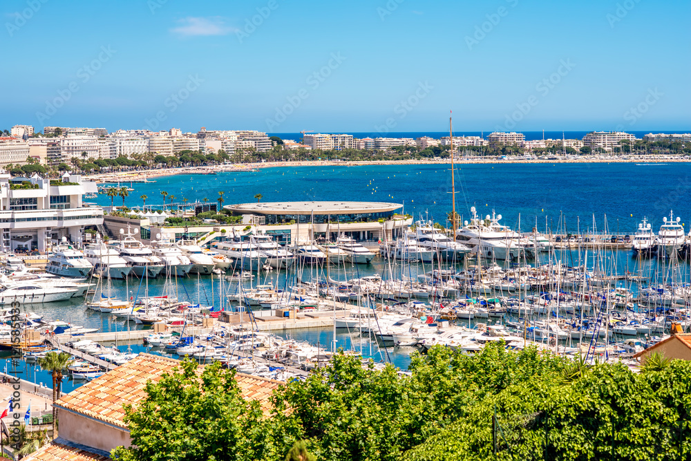 Top cityscape view on french riviera with yachts in Cannes city