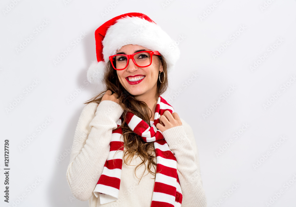 Happy young woman with Santa hat