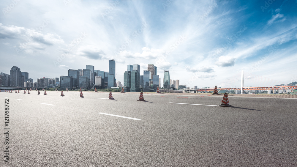 cityscape and skyline of chongqing from empty asphalt road