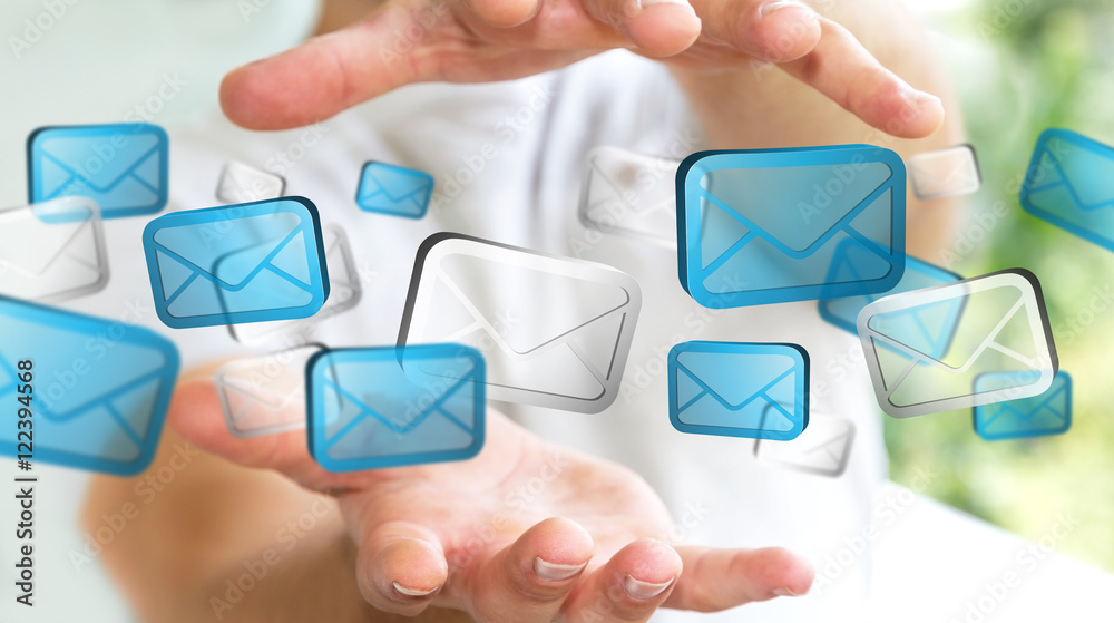 Businessman holding digital email icons ‘3D rendering’