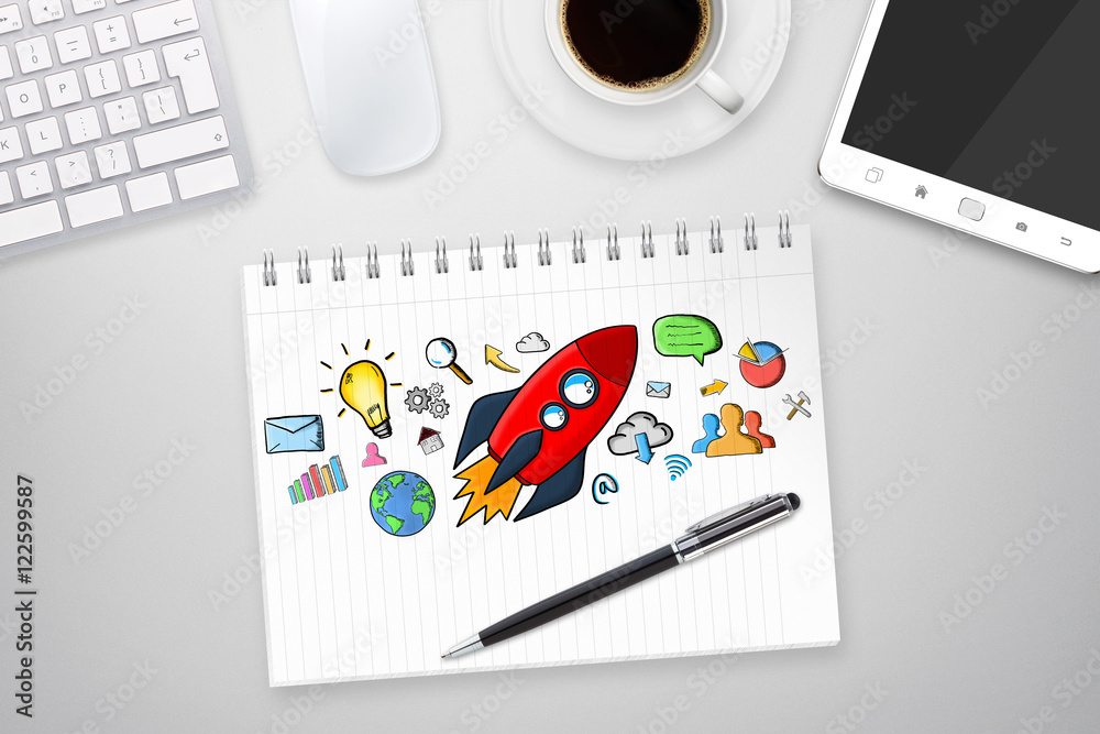 Red hand drawn rocket with icons on office background