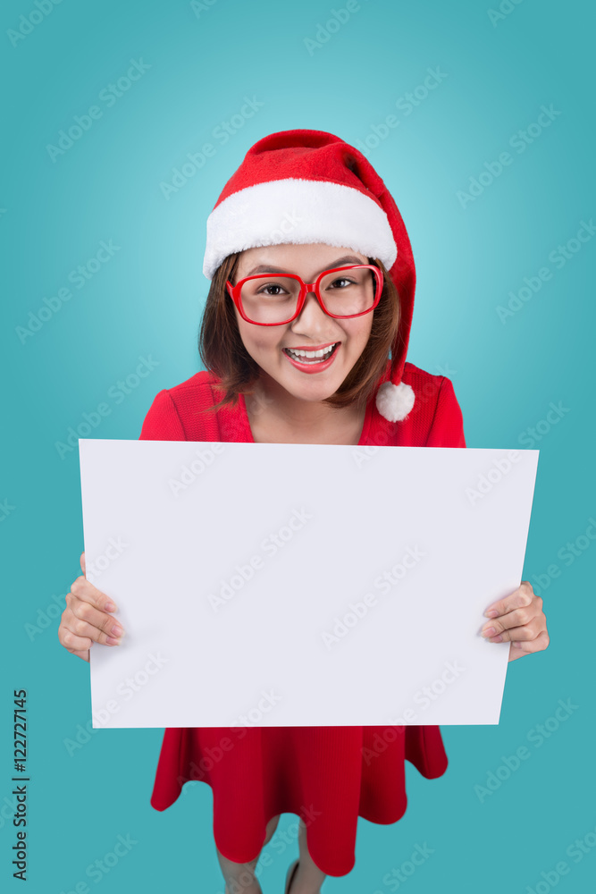 High view of smiling beautiful happy girl in christmas santa hat