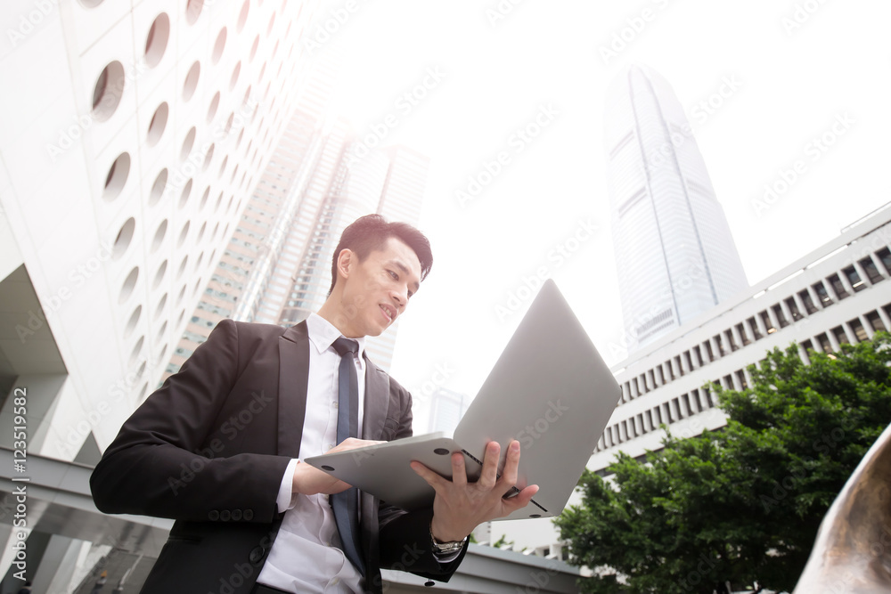 businessman use computer in honkong