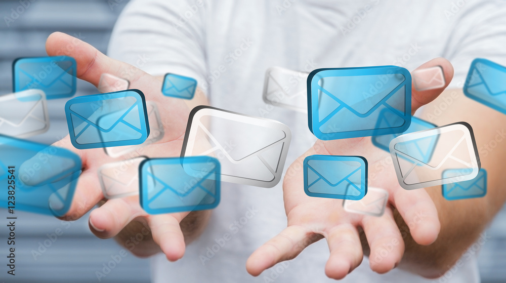 Businessman holding digital email icons ‘3D rendering’