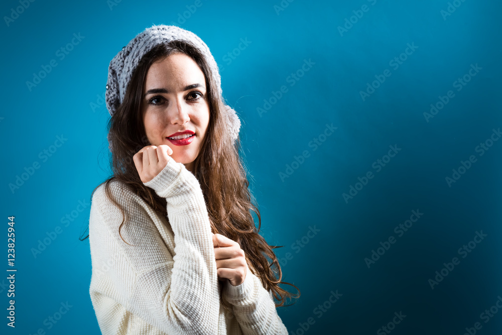 Happy young woman in winter clothes