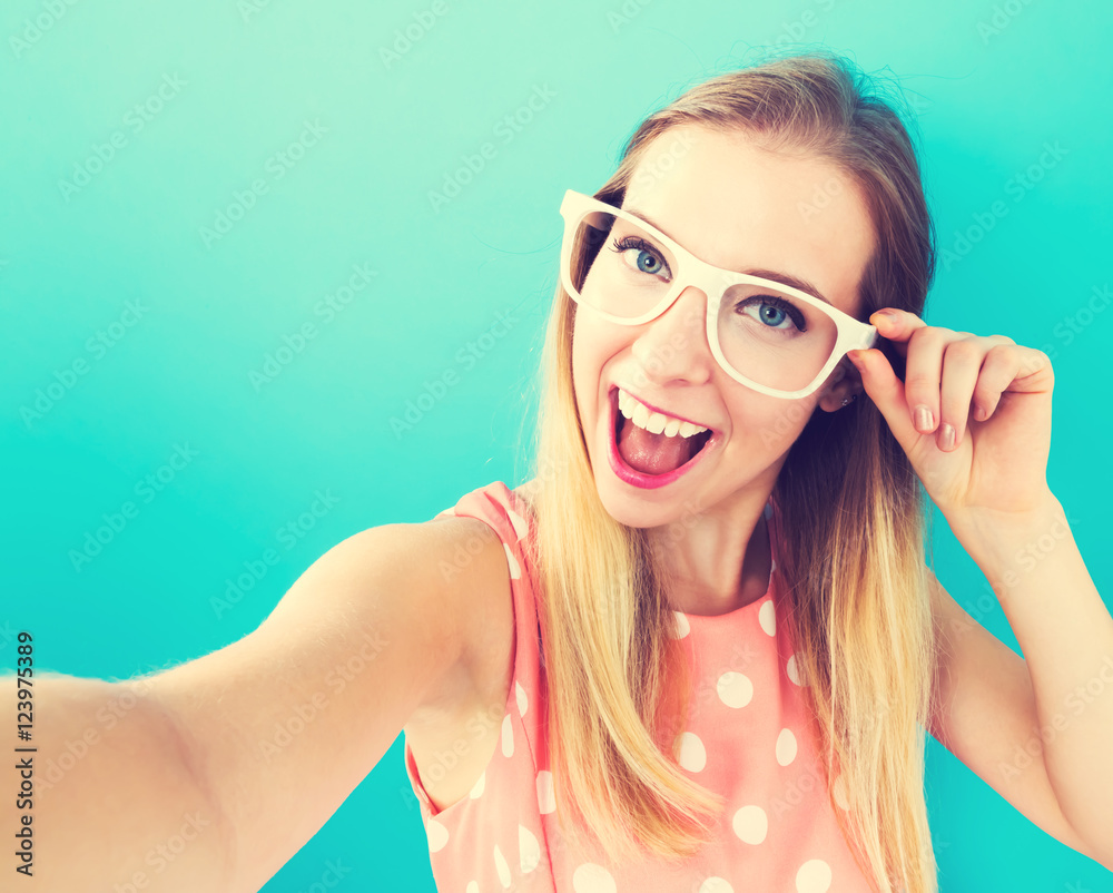 Young woman taking a selfie