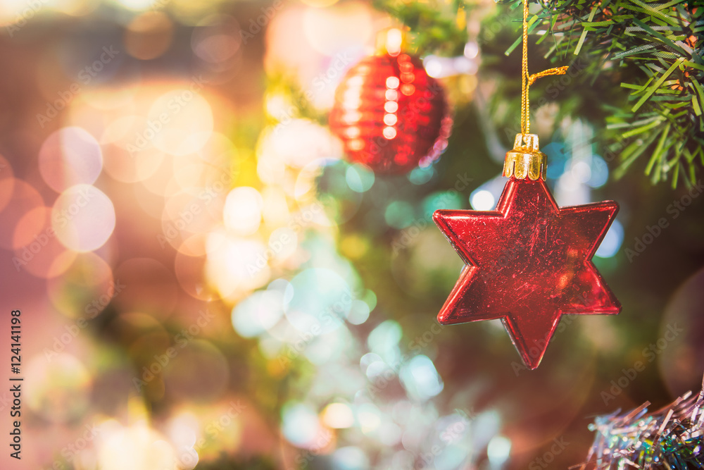 Decorated Christmas tree on blurred, sparkling