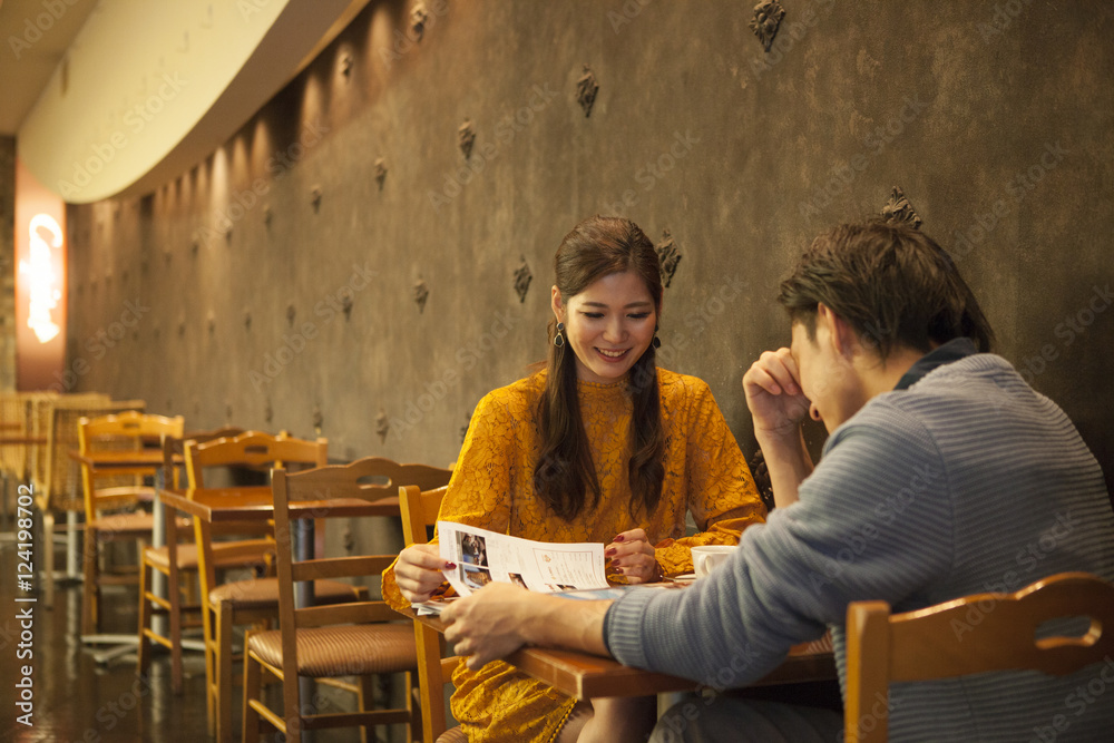 Young couple has been happily dating a cafe