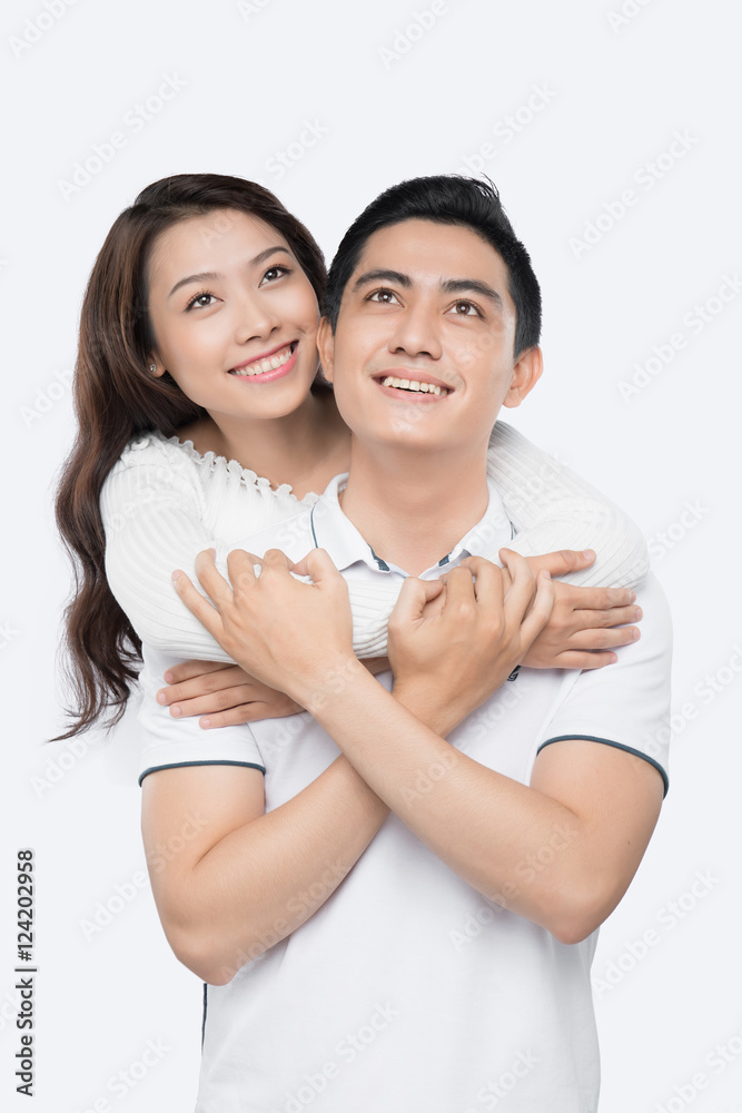 Portrait of happy couple isolated on white background. Attractiv