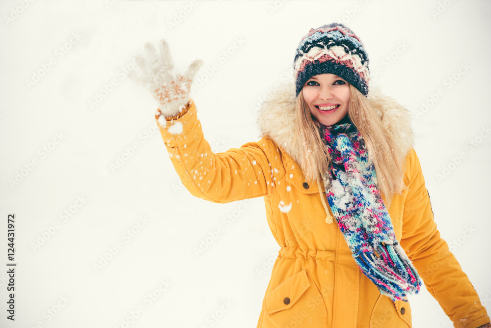 Young Woman wearing hat and scarf happy smiling playing with snow outdoor enjoy winter  vacations Li