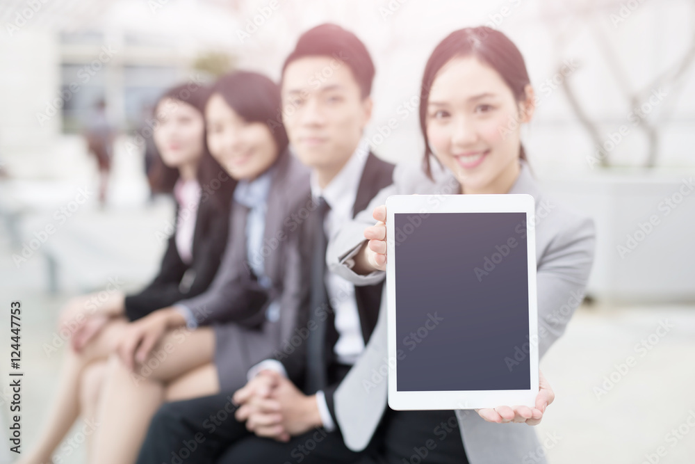 businesspeople show tablet to you