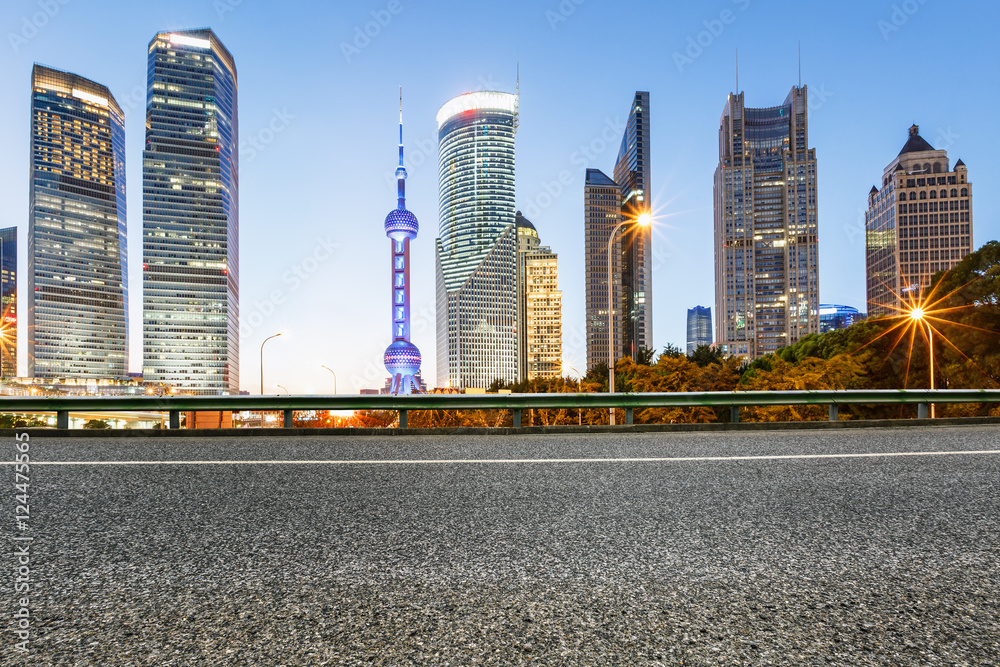 Asphalt roads and the beautiful urban scenery at night in Shanghai,China