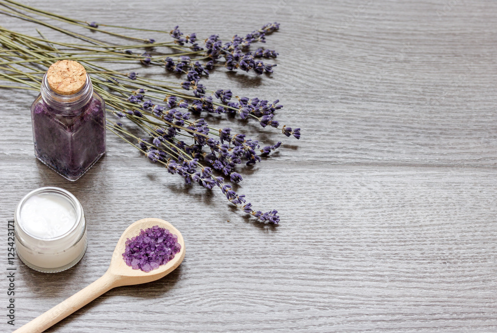 organic cosmetics with lavender on wooden background top view