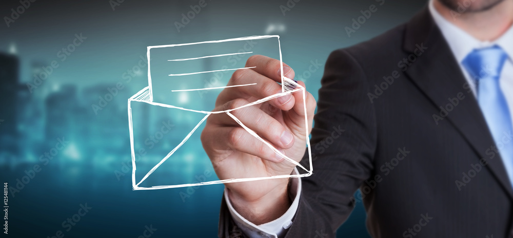 Businessman drawing manuscript contact icon with a pen