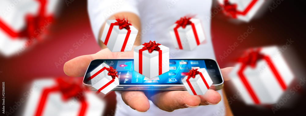 Man celebrating christmas holding gift in his hand