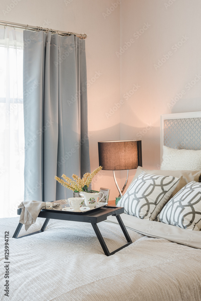 tea set cup on wooden tray in bedroom