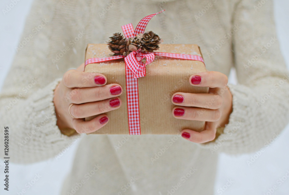 Woman holding christmas gift box