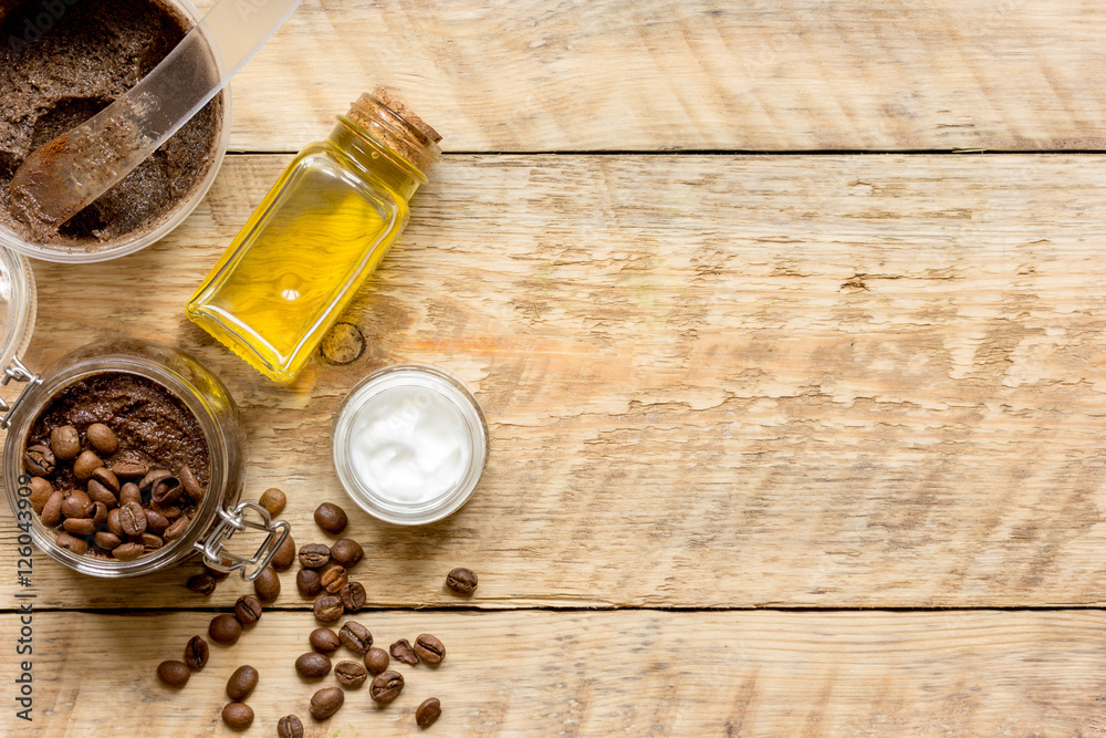 jar coffee-chocolate scrub top view on wooden table