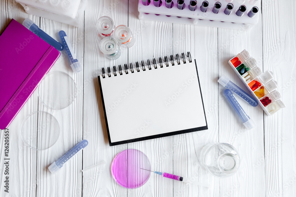 medical student working place at wooden table top view