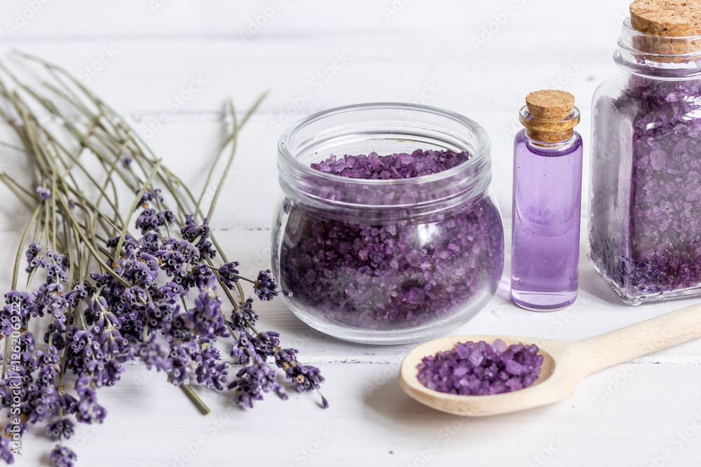 organic cosmetics with lavender on wooden background