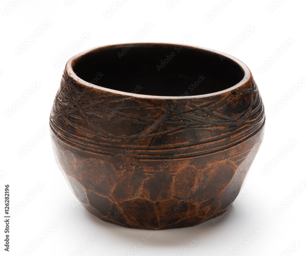 Clay ceramic bowl isolated on white background. Handmade.