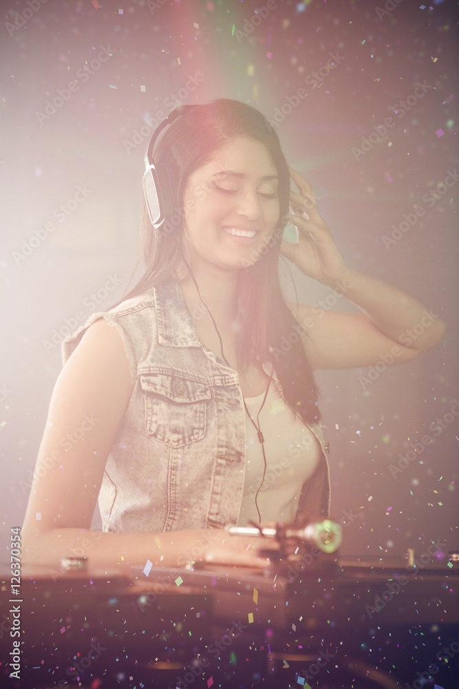 Composite image of pretty female dj playing music