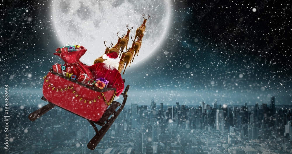 Composite image of high angle view of santa claus riding on sled