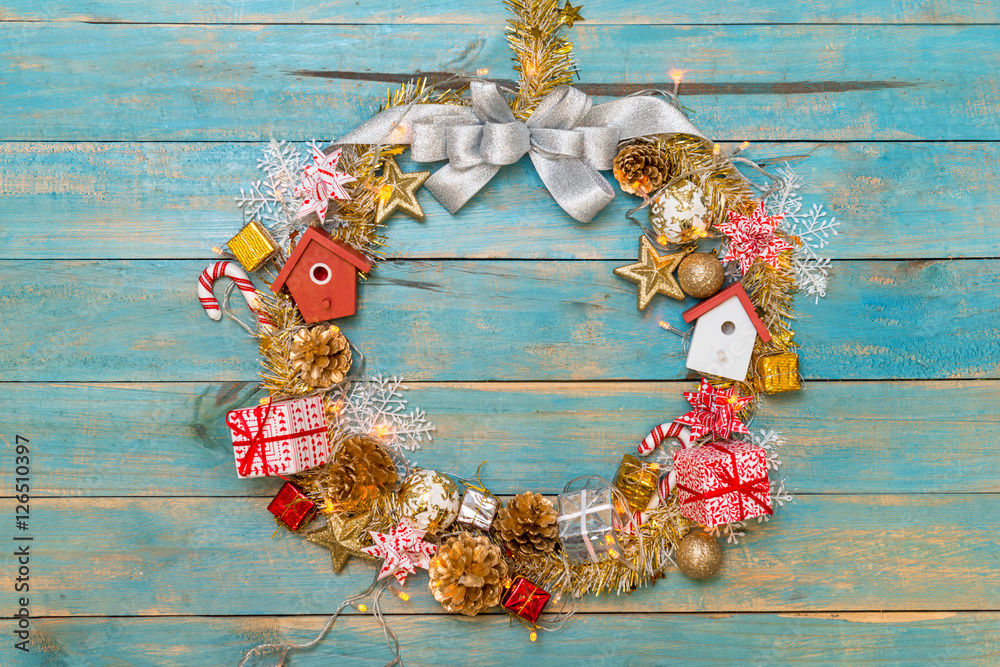 Christmas background with decorations on wooden background. Top