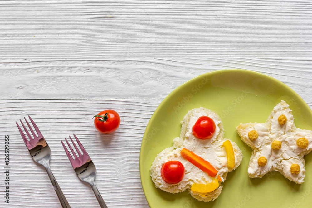 kid breakfast butterfly sandwiches top view on wooden background