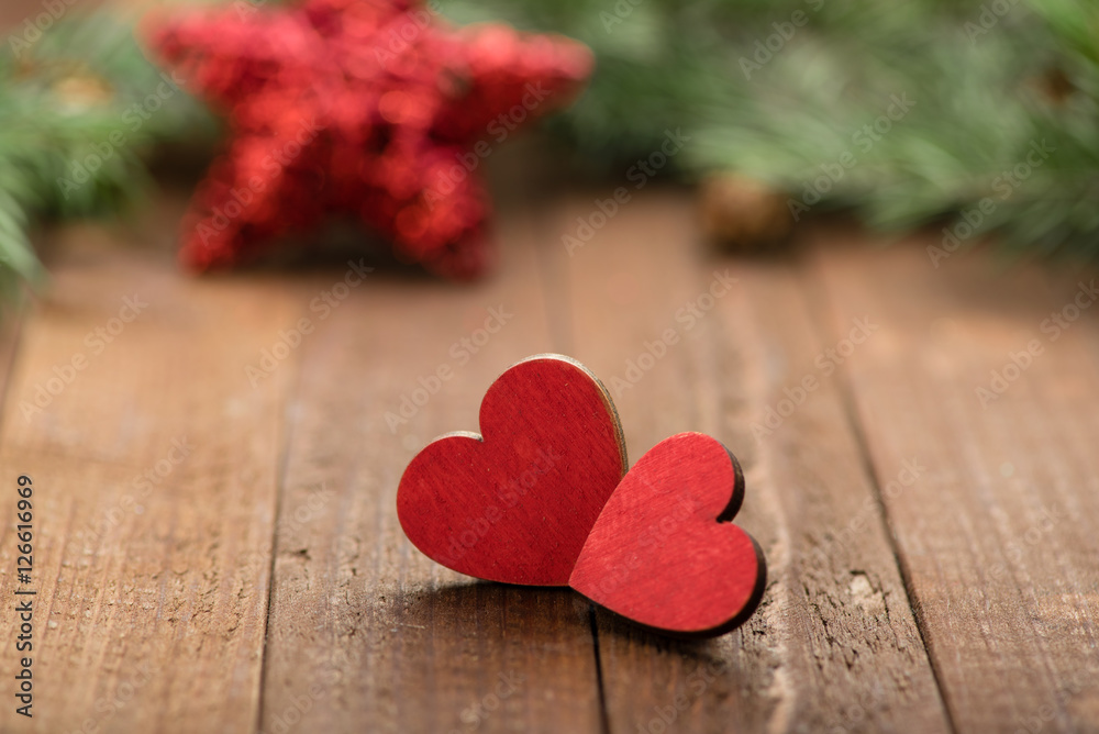 Two red wooden heart on the table. Christmas decoration. Copy space. Valentine. Love.