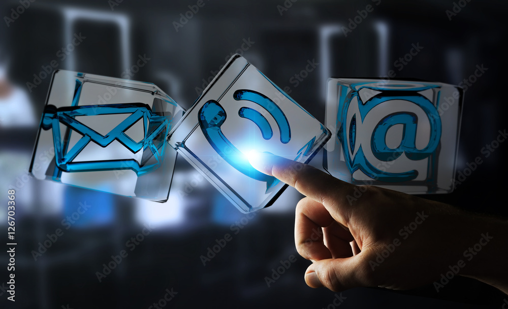 Businessman touching transparent cube contact icon with his fing