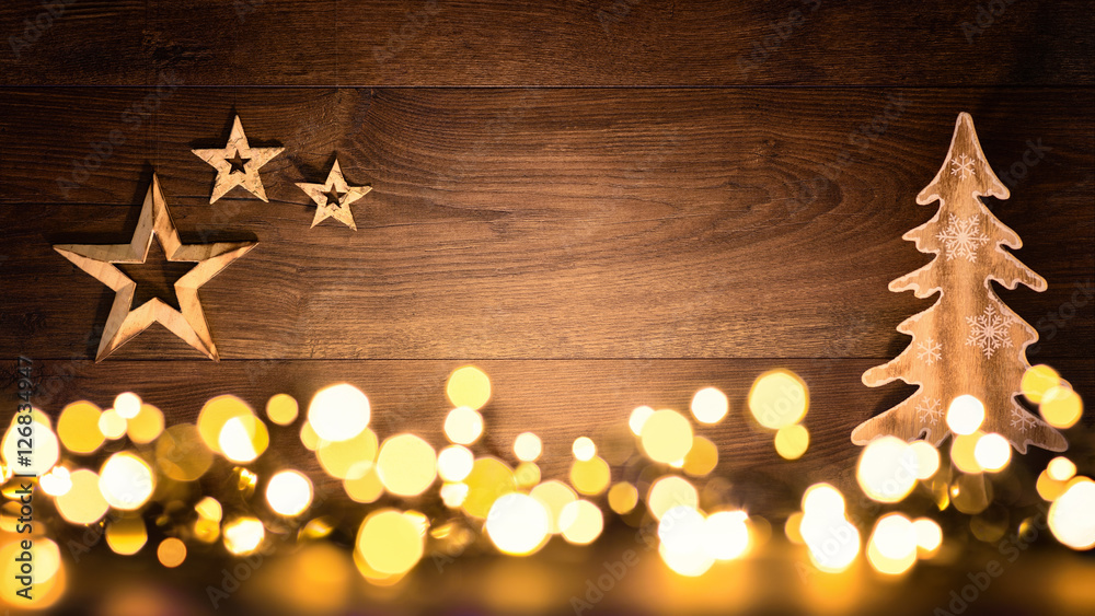 Weihnachten Hintergrund aus Holz und Lichtern, fröhlich und kontrastreich