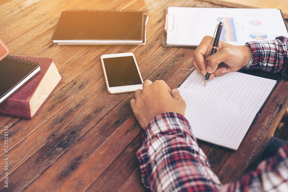 Businessman or freelance working on a desk