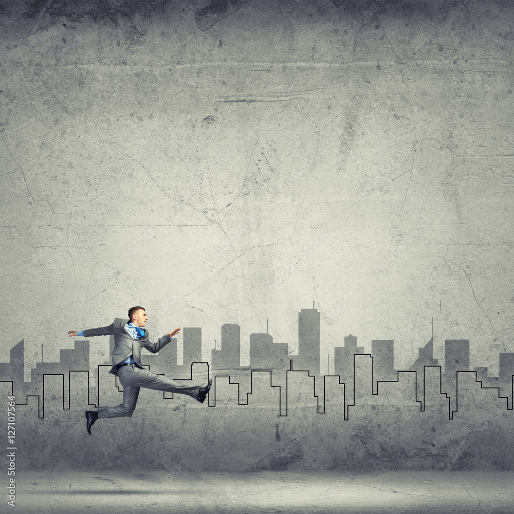 Businessman jumping high