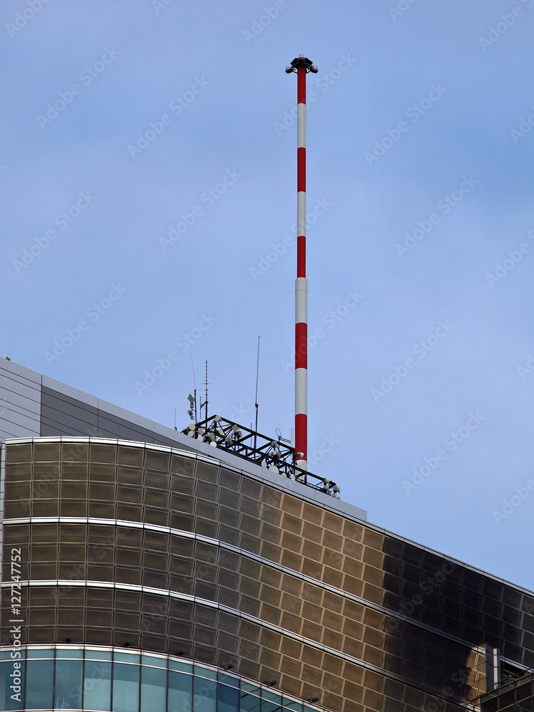 spire on the roof of the building