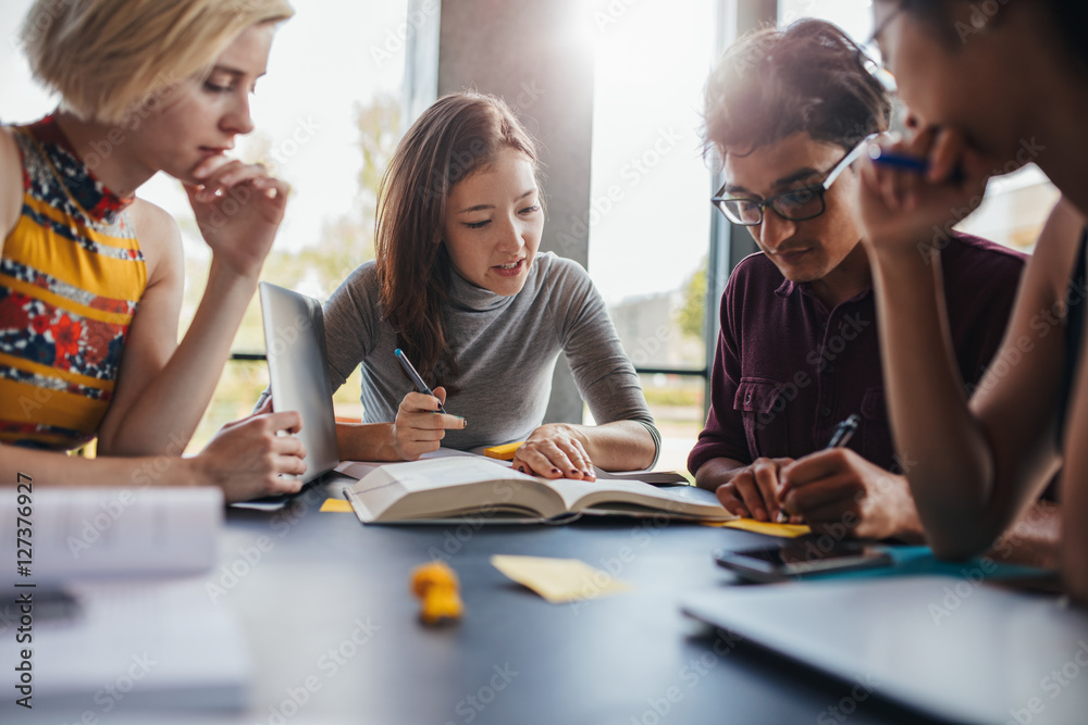 Group of students doing school assignment