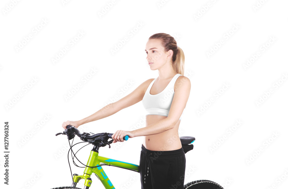 Donna con bicicletta fa fitness o corsa