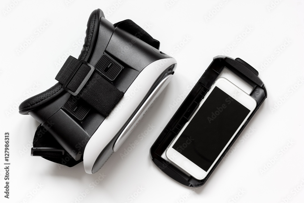 virtual reality glasses with smartphone on white background