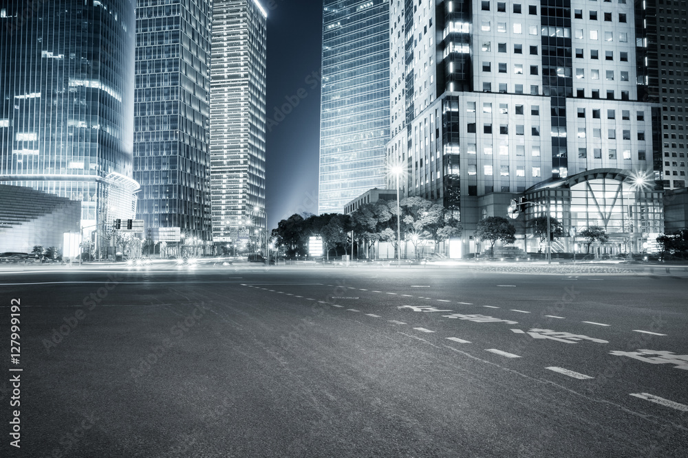 modern buildings at night and road