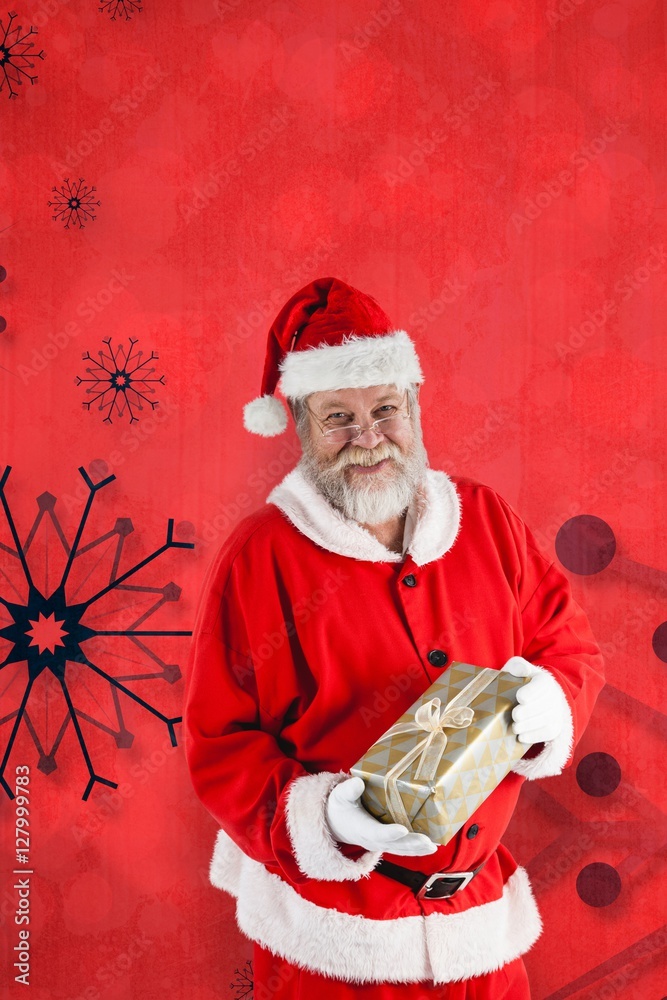 Composite image of portrait of santa claus holding christmas gif